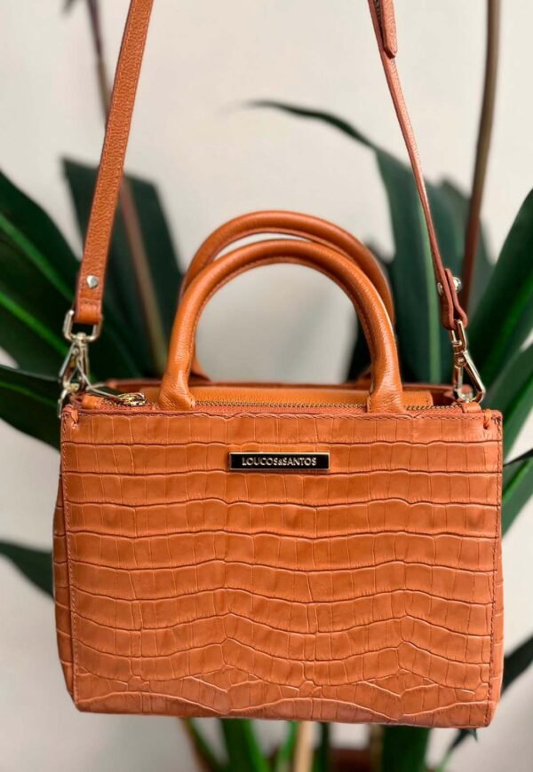 Bolsas em couro Loucos e Santos